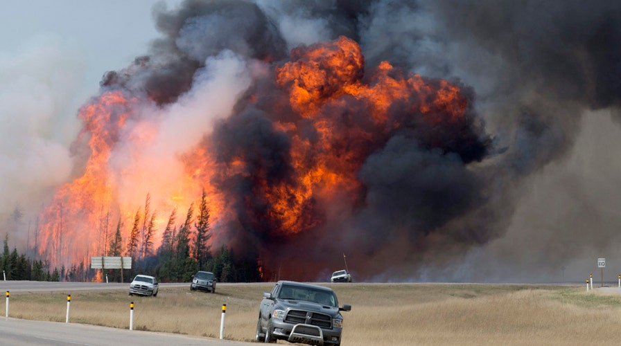 Canada's wildfire explodes in size, could last months