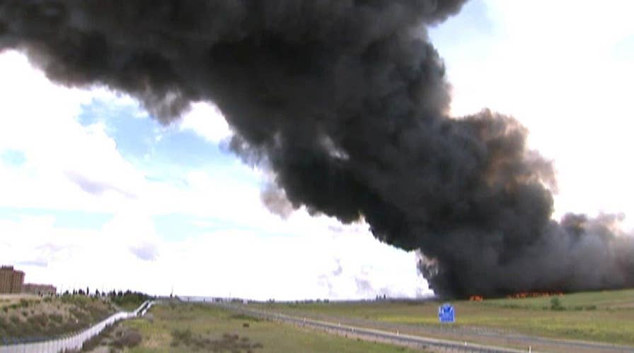 Massive tire fire visible for 20 miles, police suspect arson