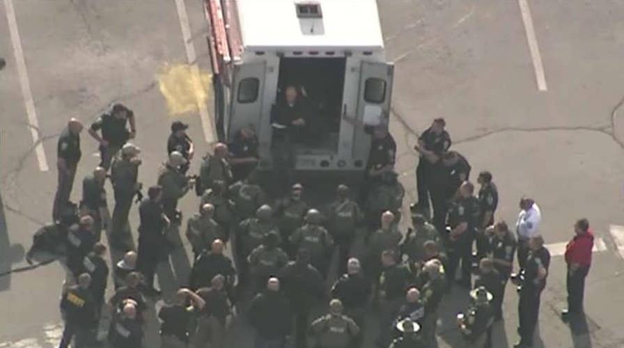 Manhunt under way for suspect in shootings of 2 NH policemen