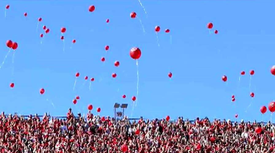 Lawsuit calls for end to Nebraska football tradition