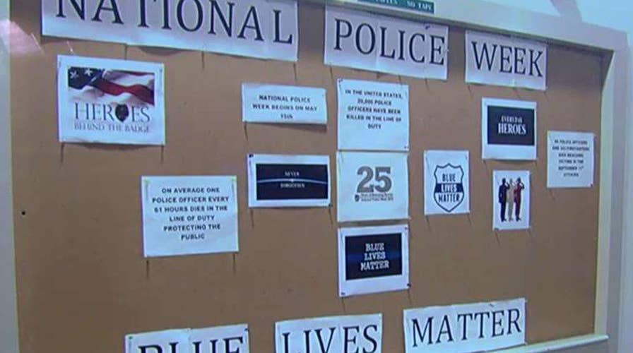 Campus controversy over defacing of pro-police display