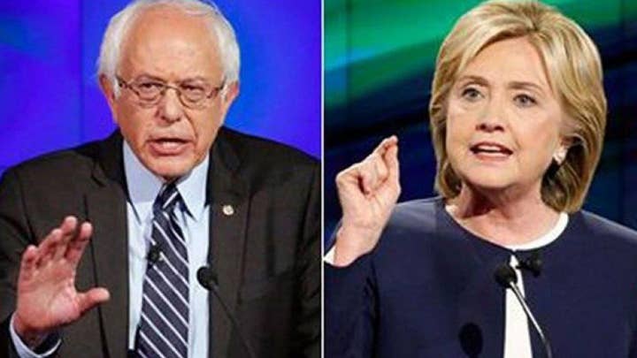 Clinton calls for party unity as Sanders vows to fight on
