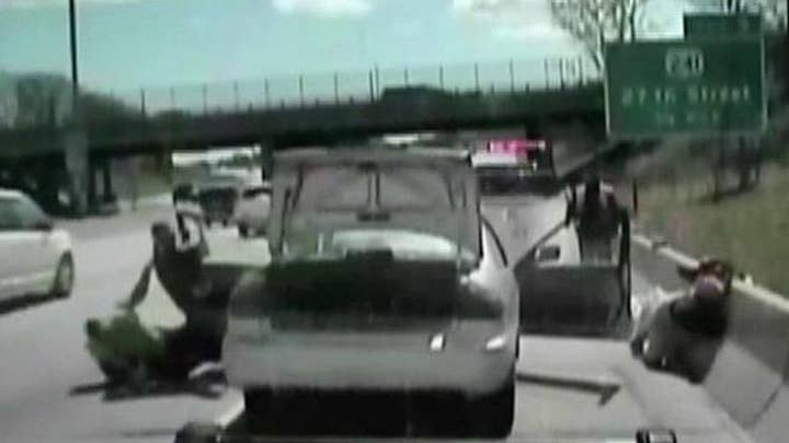 Suspect fleeing traffic stop knocks deputies into traffic