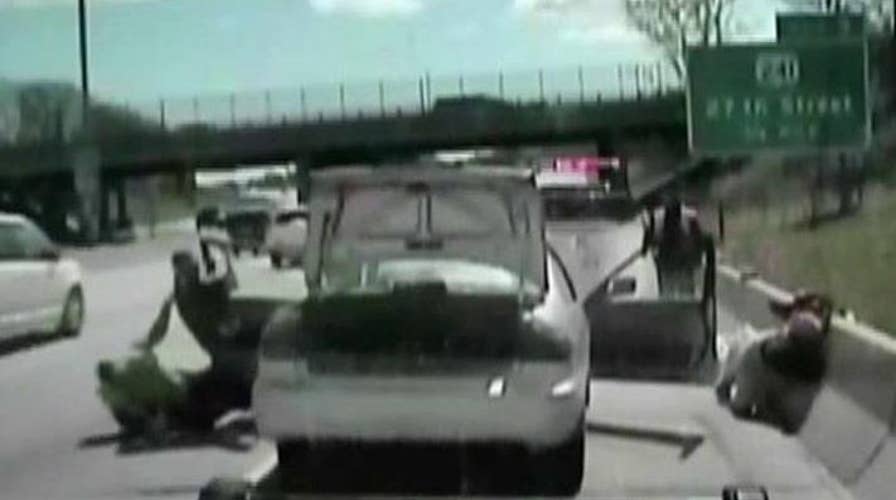 Suspect fleeing traffic stop knocks deputies into traffic