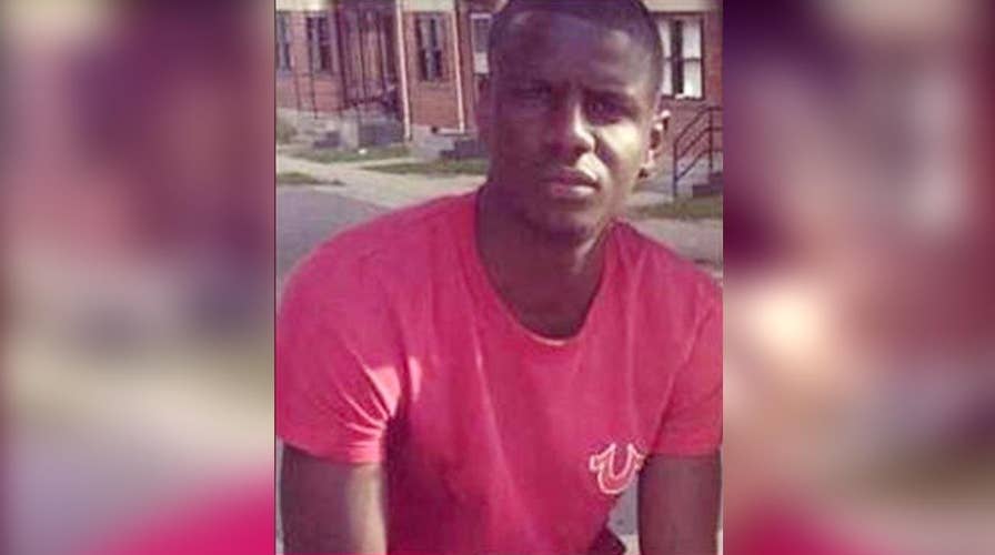 Violence leaves Baltimore on edge before 3rd Gray trial