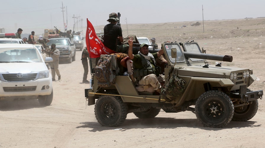 Iraqi forces battling ISIS surround Fallujah