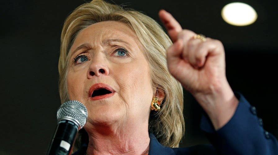 Clinton deflecting from her own record by attacking Trump?