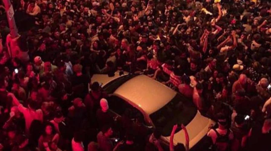 Fans flood streets after Kanye West announced pop-up concert