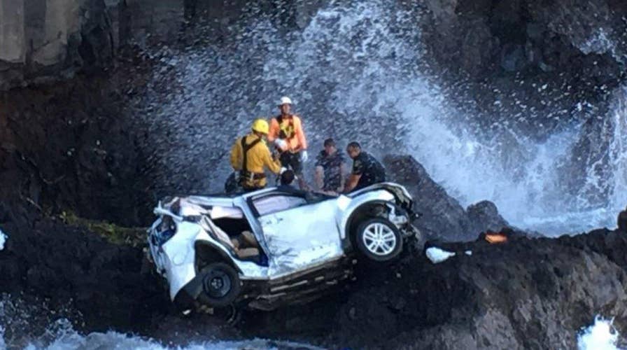 Woman charged with murder after car crash kills twin sister