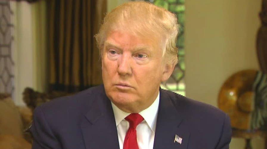 Trump doubles down on criticism of press, Clinton, judge