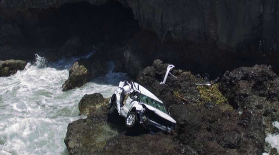 Woman charged with murder in twin sister's death