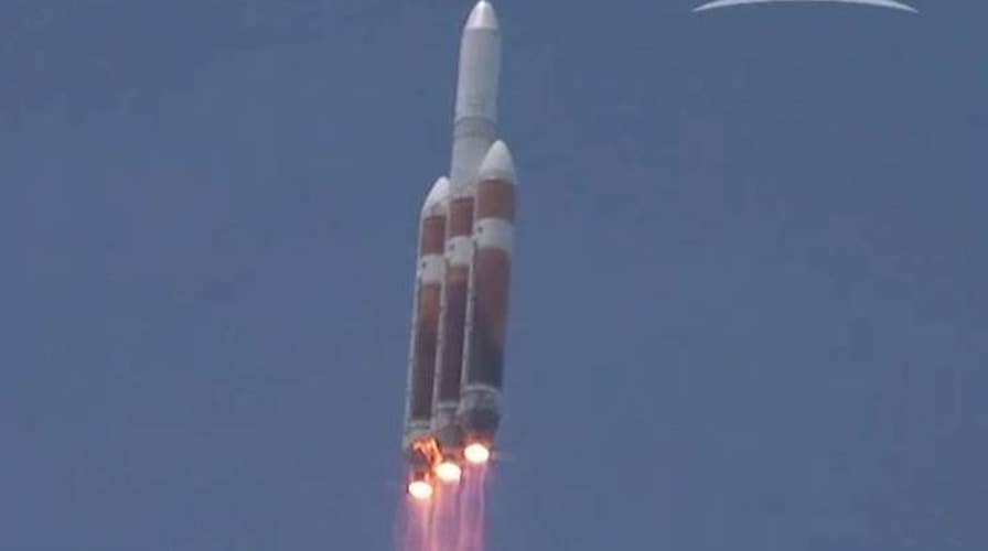 Rocket reportedly carrying top secret spy satellite launches