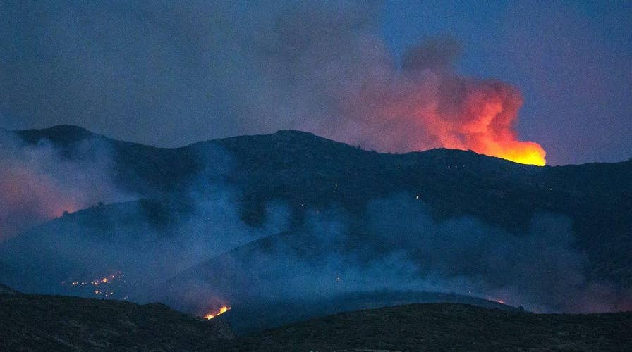 Wildfires burn in Utah, California, New Mexico, Arizona