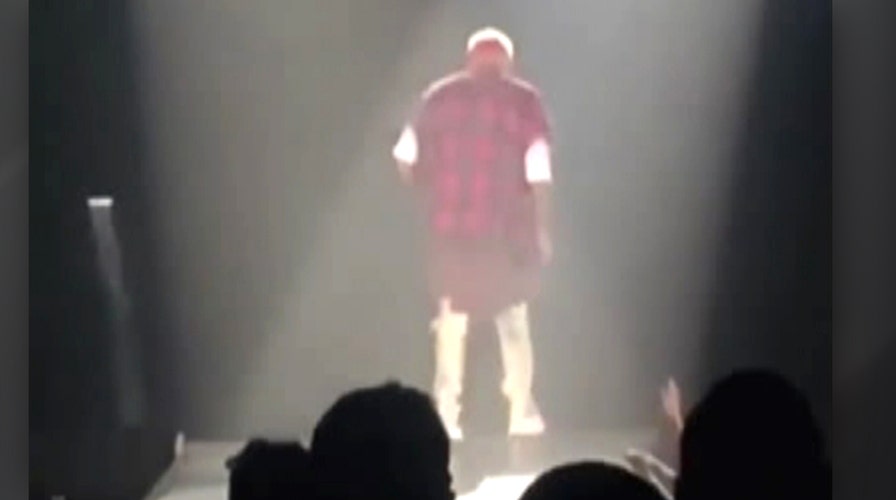Justin Bieber falls through stage during concert
