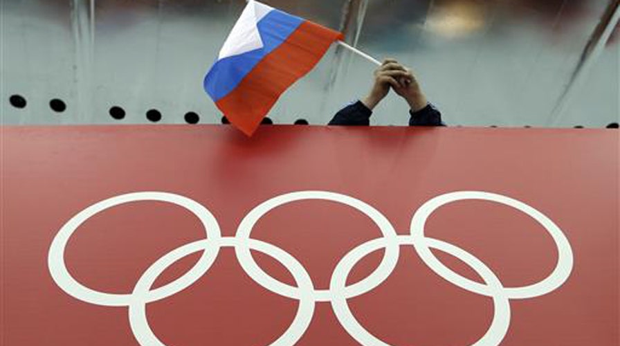 Russian track and field team banned from Olympics for doping