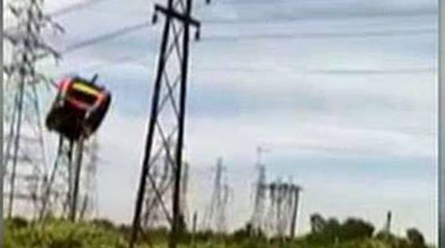 Video: Bounce house flies away, slams into power lines