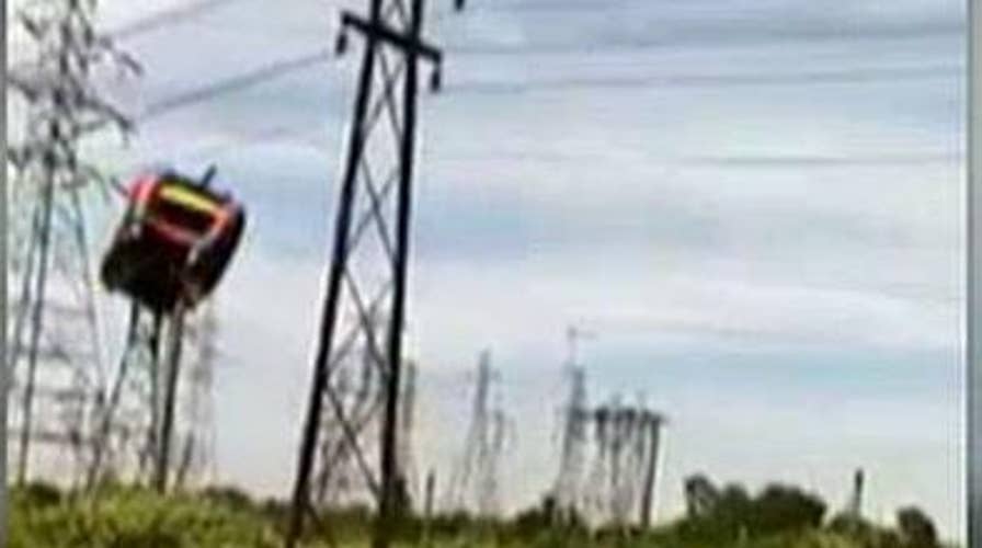 Video: Bounce house flies away, slams into power lines