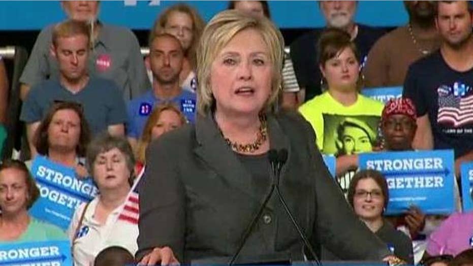 Clinton pushes for party unity as she touts economic plan