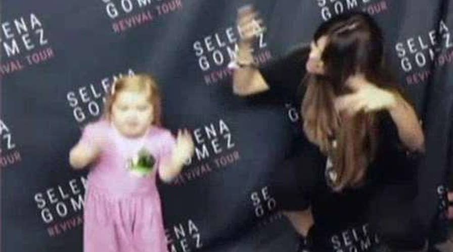 Going Viral: Selena Gomez rocks out with a young fan