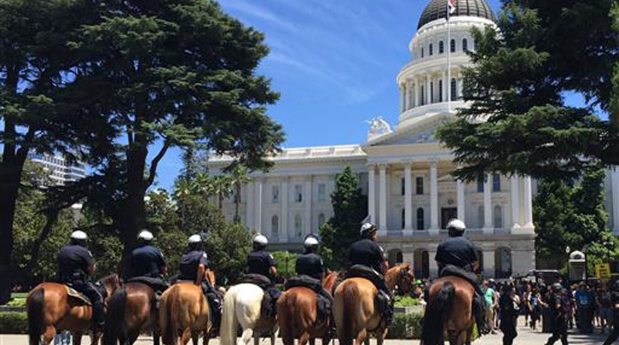 White nationalist group, counter protesters clash