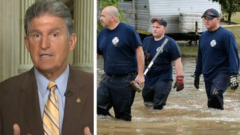 In rain-soaked West Virginia, flood victims planning funerals