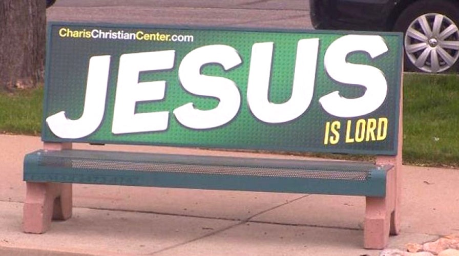 Pastor battles city over Jesus-related bus stop bench ads