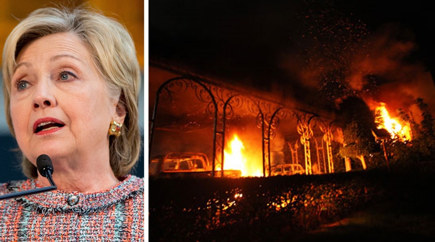 Clinton brushes off blistering Benghazi report
