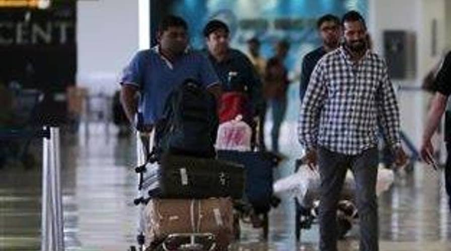 Istanbul airport reopens as crews clean up bomb debris