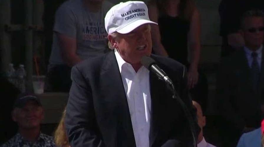 Trumps rails against trade policies as he falls behind