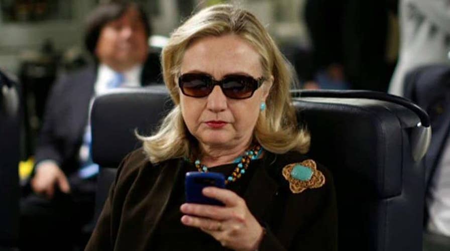 Should Clinton be charged or cleared in email probe?