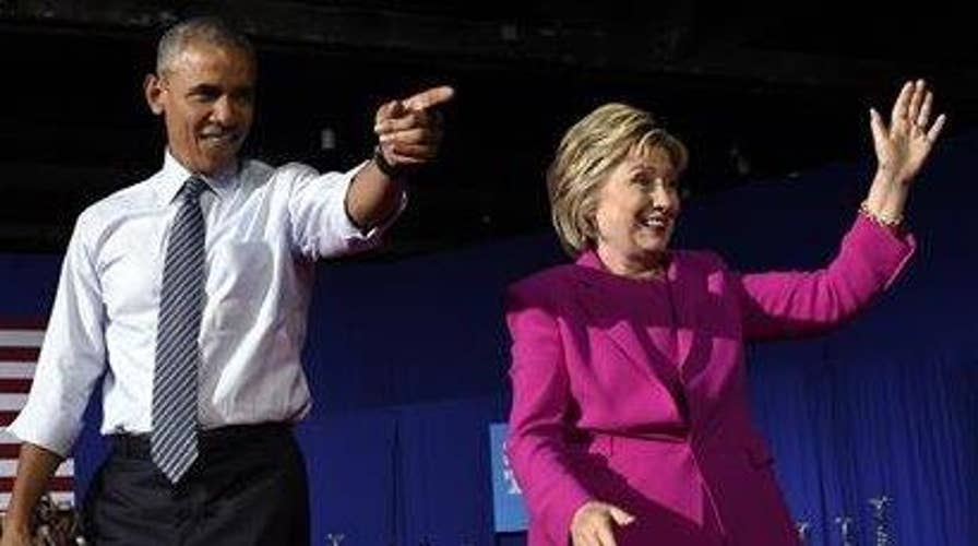 Clinton tweaks Trump during campaign stop with Obama