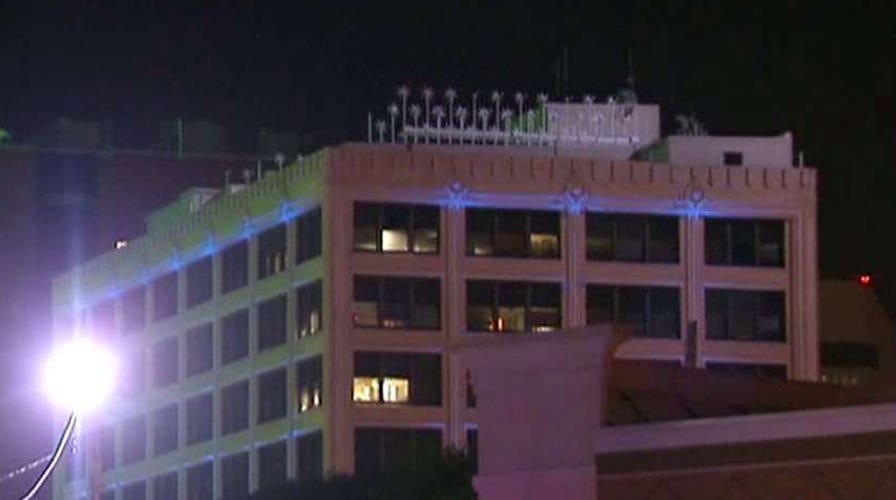 Suspect in high rise, exchanging gunfire with police