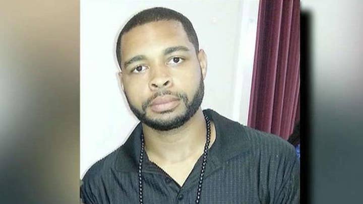 Dallas sniper wrote message on wall in blood