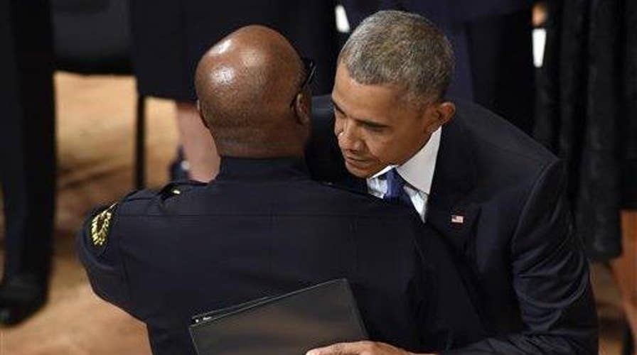 President attends somber ceremony honoring fallen officers