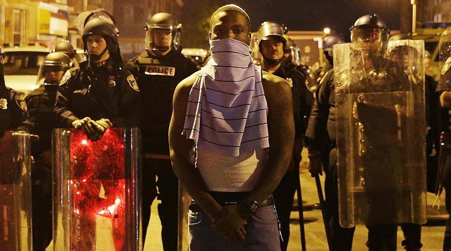 How gap between police, black community worsened under Obama