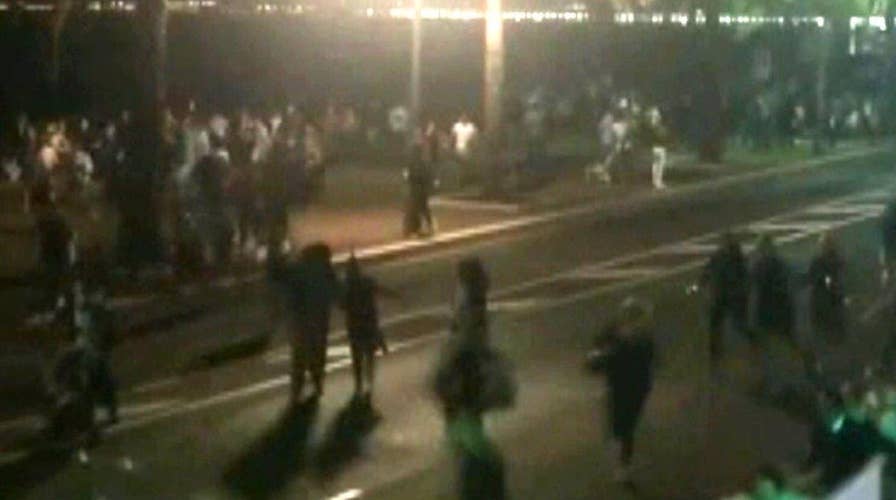 Report: Driver rammed truck into crowd, opened fire in Nice