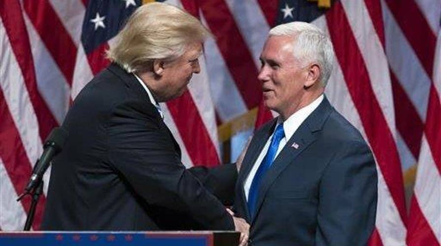 Trump highlights differences between Pence and Clinton