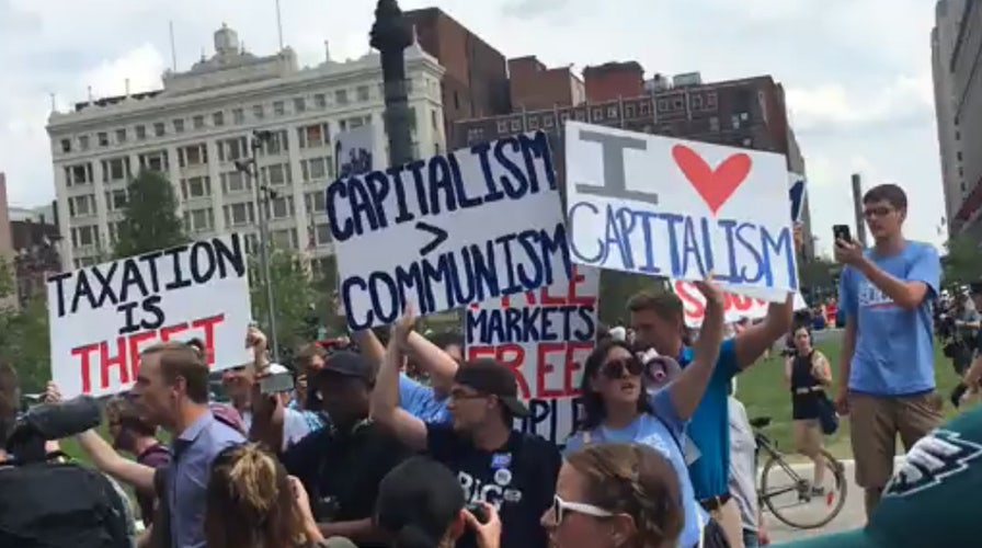 Pro-capitalism, anti-capitalism protesters spar at RNC
