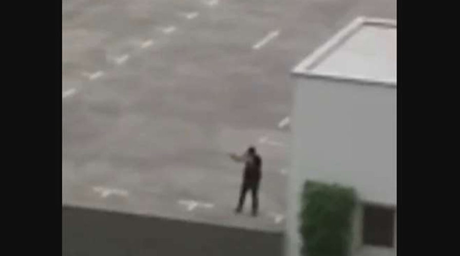 Video: Gunman opens fire on rooftop parking lot in Munich