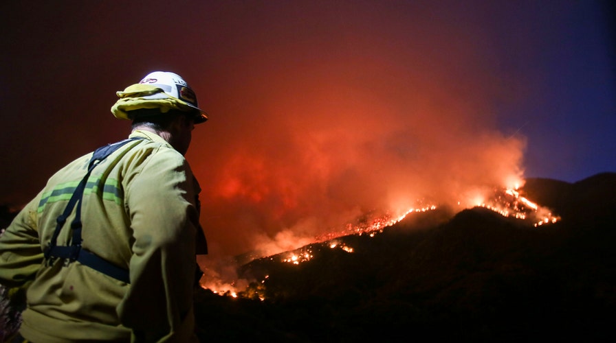 California wildfire triples in size