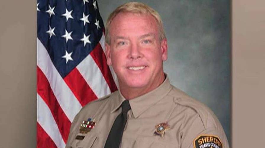Manhunt under way for killers of Texas deputy