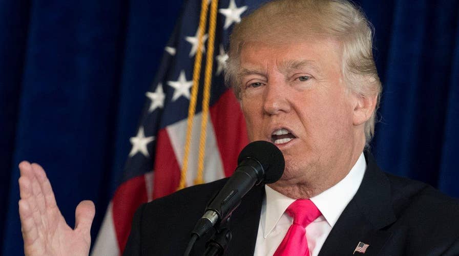 Trump to release taxes when audit's over, denies Russia link