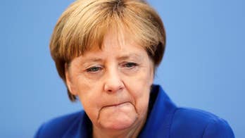 German crews build barrier higher than Berlin Wall to separate town from refugee wave