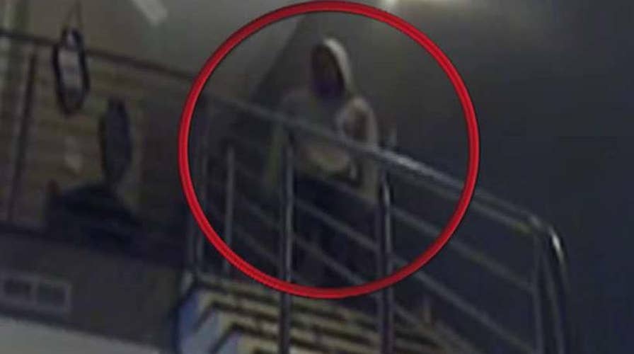 Caught on camera: Home invader watches couple sleep