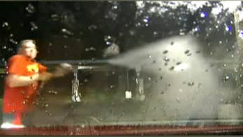 Caught on video: Car wash power spray thwarts carjacking