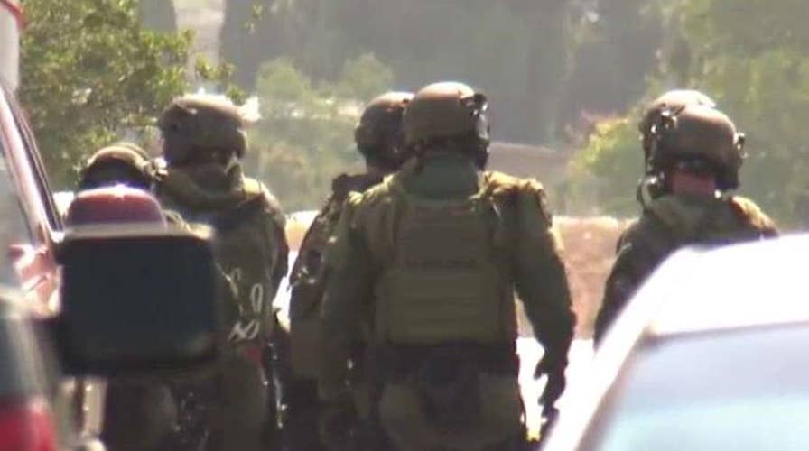 SWAT team surrounds 2nd San Diego shooting suspect's home