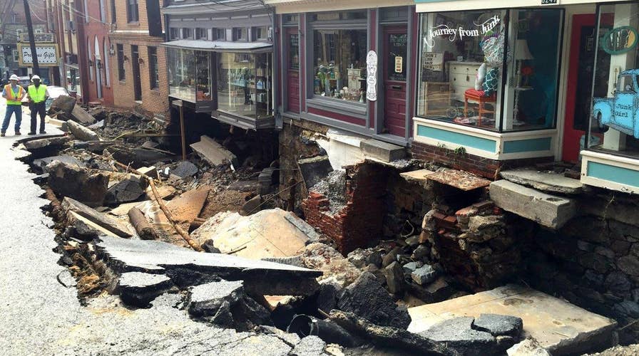 Deadly Maryland flash floods look like a 'war zone'
