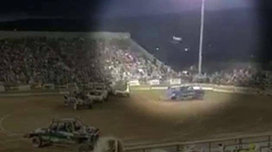 Flying car part injures spectators at demolition derby