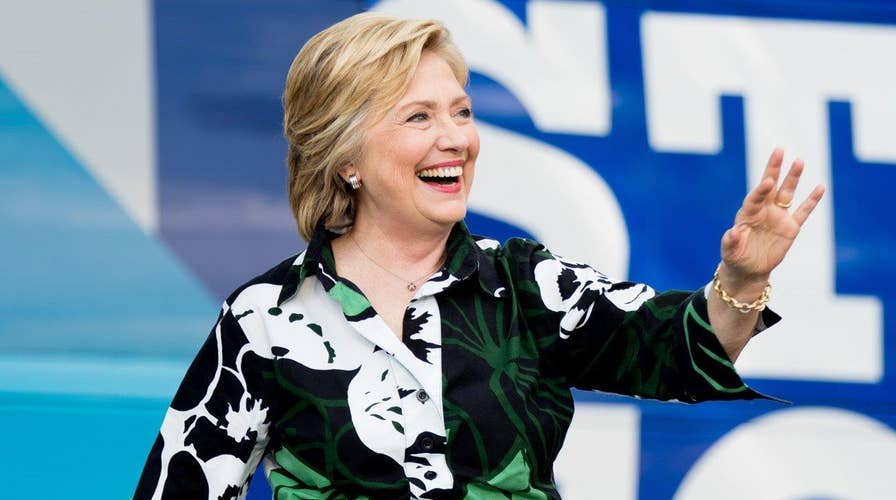 Clinton courts working class whites in Pa., Ohio