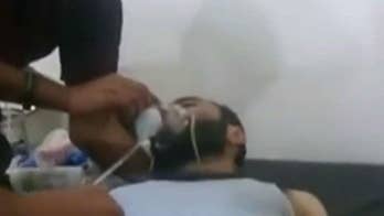 Toxic gas dropped in Syria near site of Russian helicopter crash, rescuers say